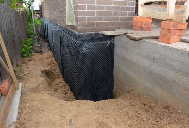 SJ Waterproofing Pros technician performing targeted Foundation Crack Repair assessment in Perry Hall, MD